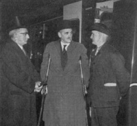 Three men in front of DMU