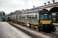 Class 111 DMU in green with yellow panel