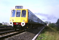 Class 127 DMU in blue with embelishments and working headcodes